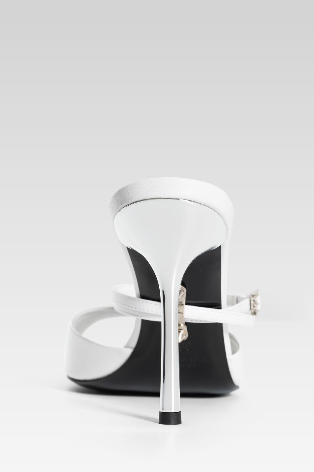 Silvia Marson — white sandal heel detail